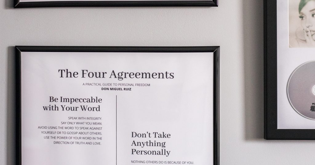 frame displays the Four Agreements